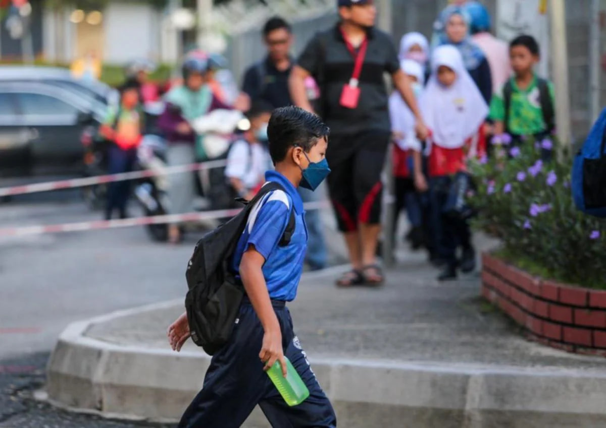 pemakaian baju sukan